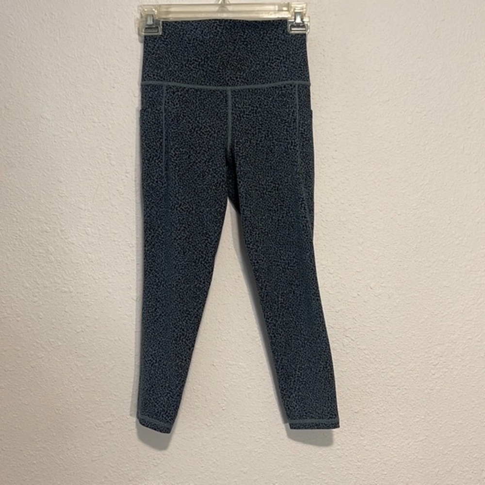 Athleta Salutation stash pocket xsp